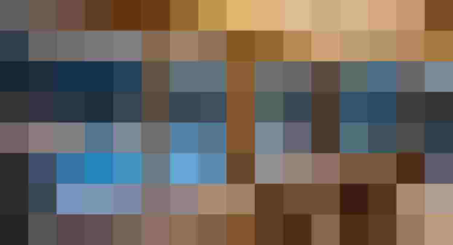 Loungebereich mit Liegen vor großen Fenstern mit Blick auf den Außenpool